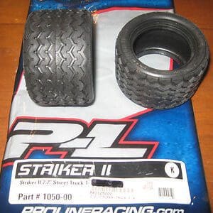 Two rubber tires for RC street trucks.